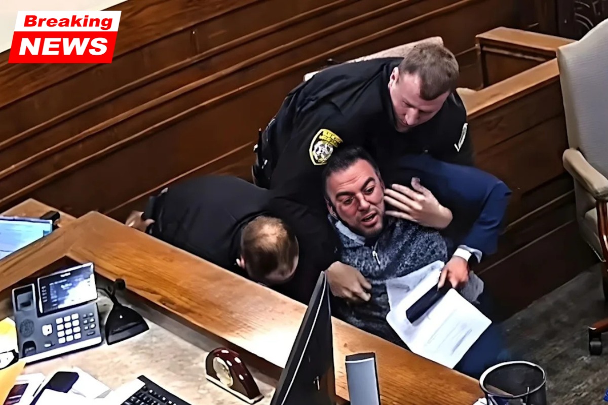 "I Can't Breathe!" During an arrest, a transgender lawyer who identifies as male interrupts a custody hearing and demands female officers