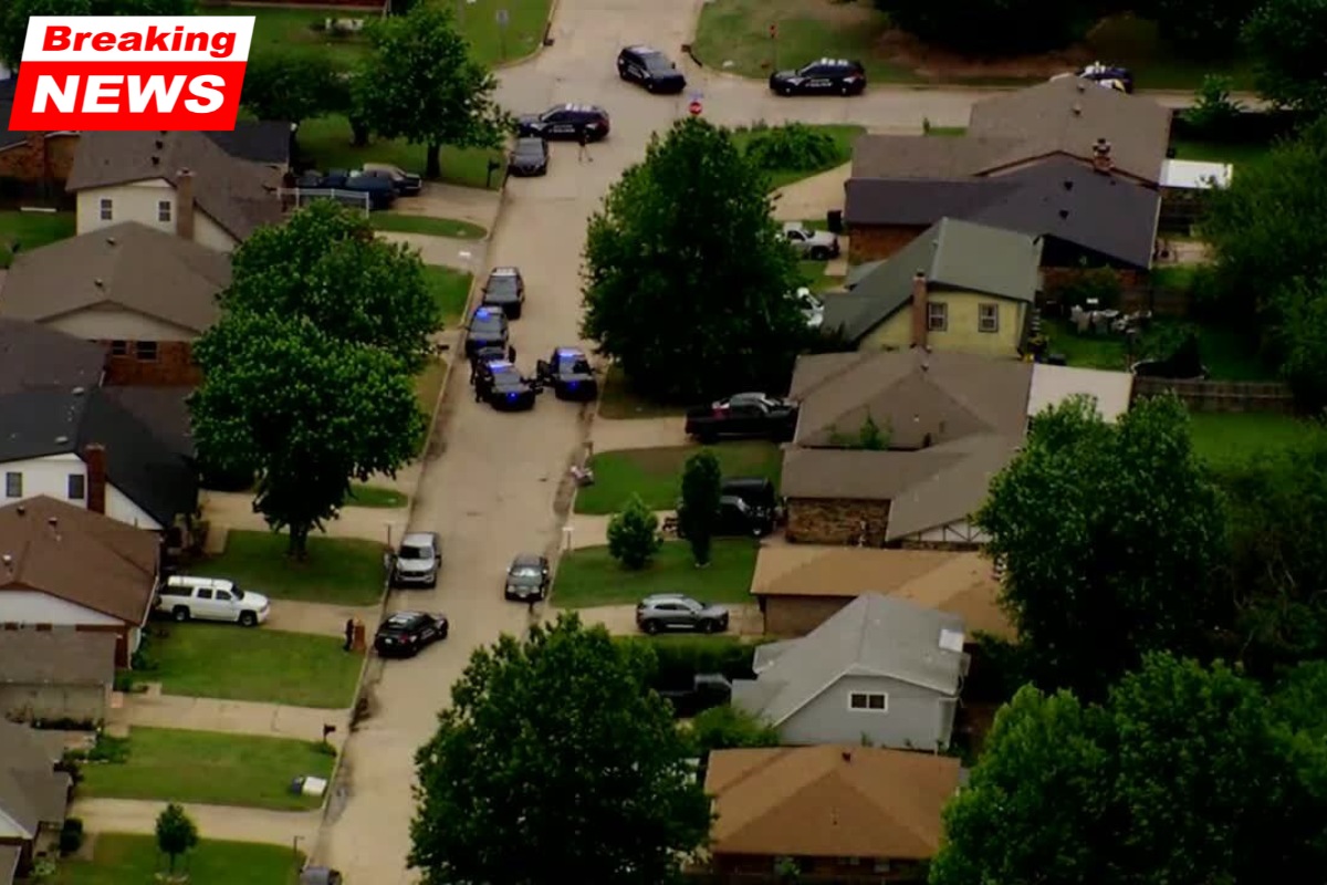 Moore Police serve an arrest warrant while participating in an active standoff
