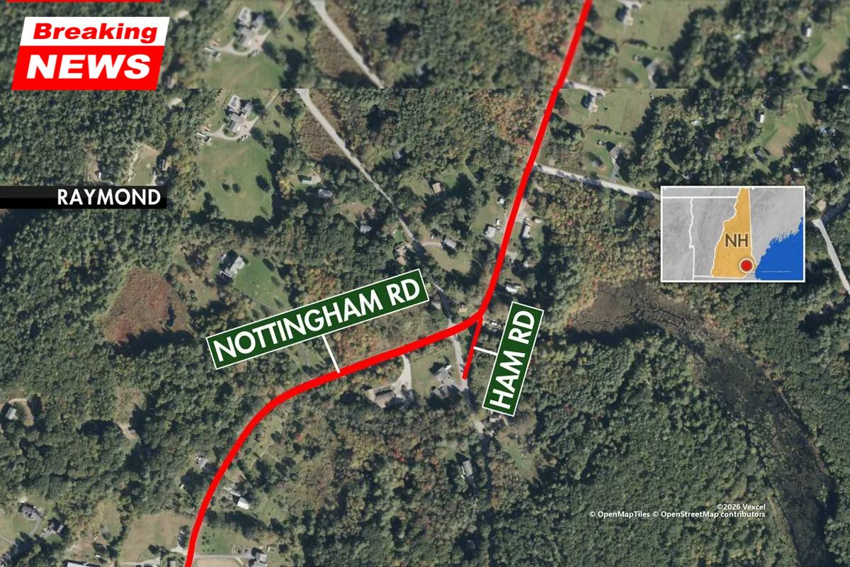 A large manhunt is in progress in a town in New Hampshire after a gunman is suspected of shooting a police officer and setting fire to a family