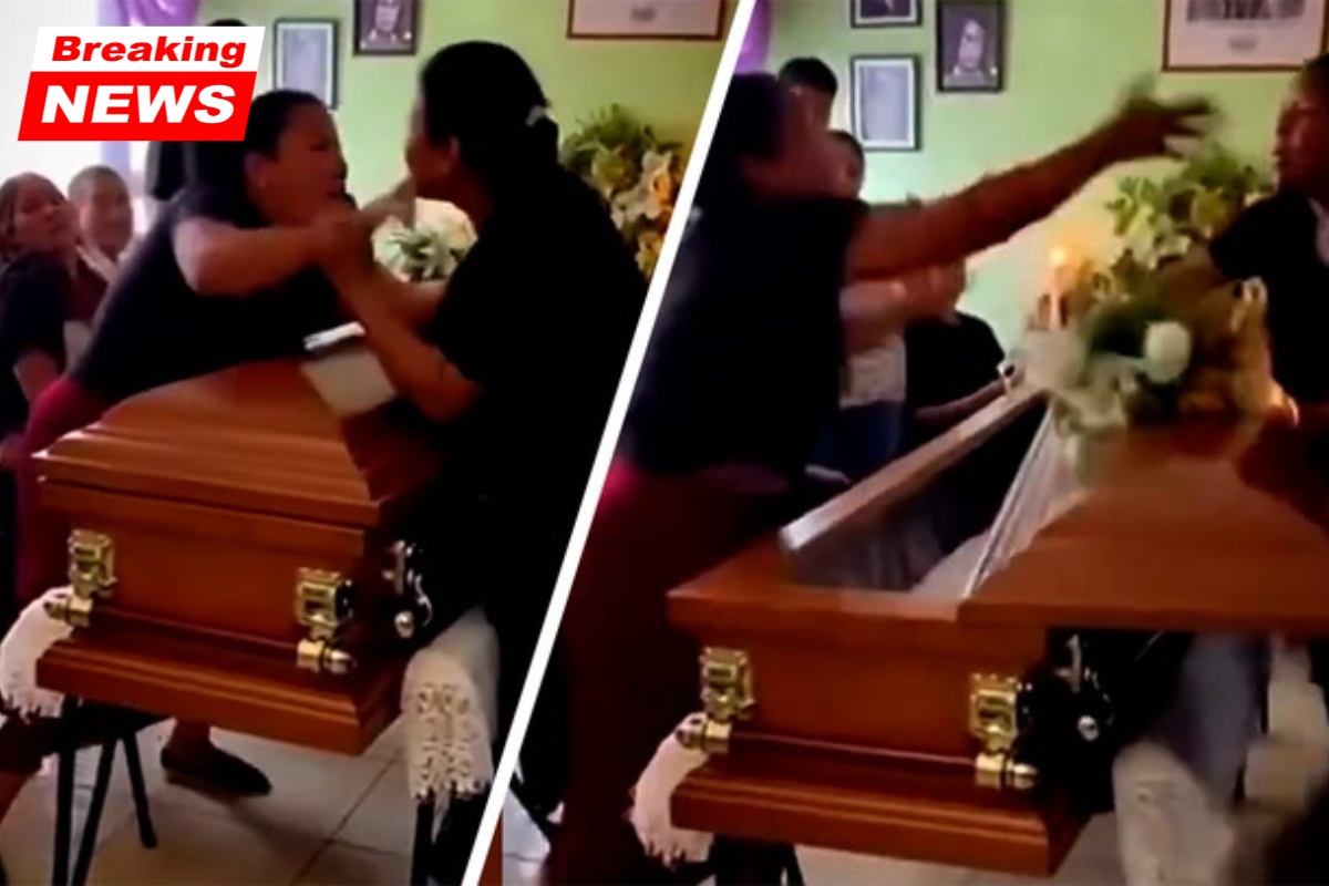 Wild video footage captures women brawling across the coffin at a funeral after discovering that they both dated the deceased individual