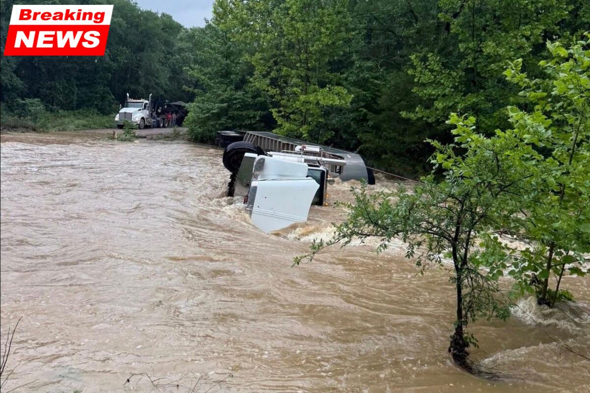 After trying to drive through floodwaters in Oklahoma, a truck driver transporting gravel had been rescued